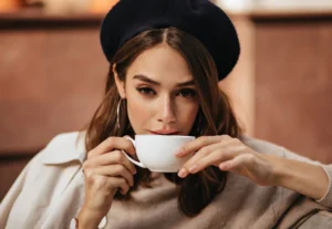 Young lady drinking coffee